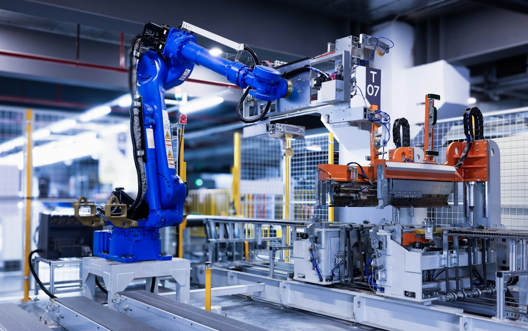 Industrial robotic arm working on an automated assembly line in a manufacturing plant